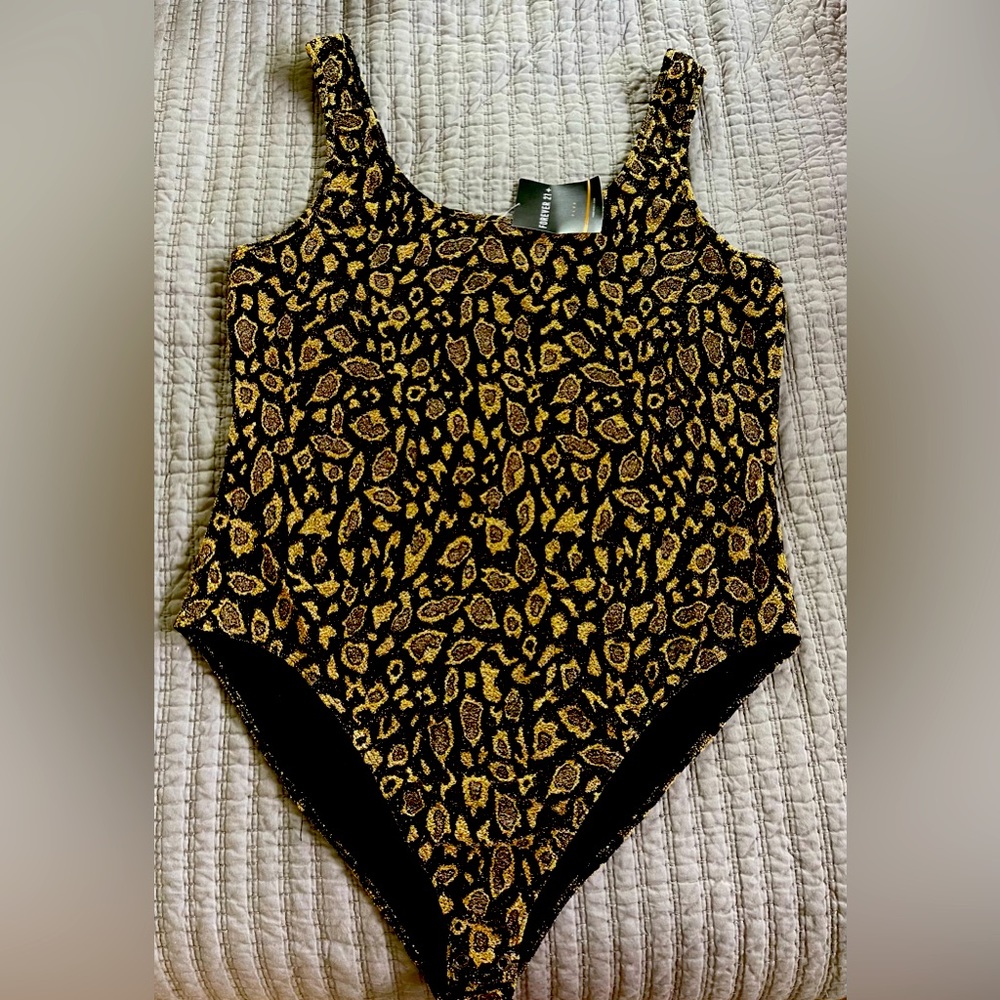 NWT Forever 21 black and gold body suit. Size 2x